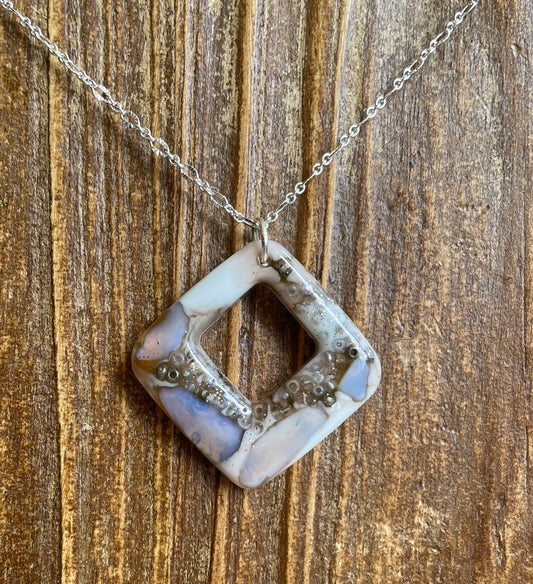 Diamond shape moon stone pendant
